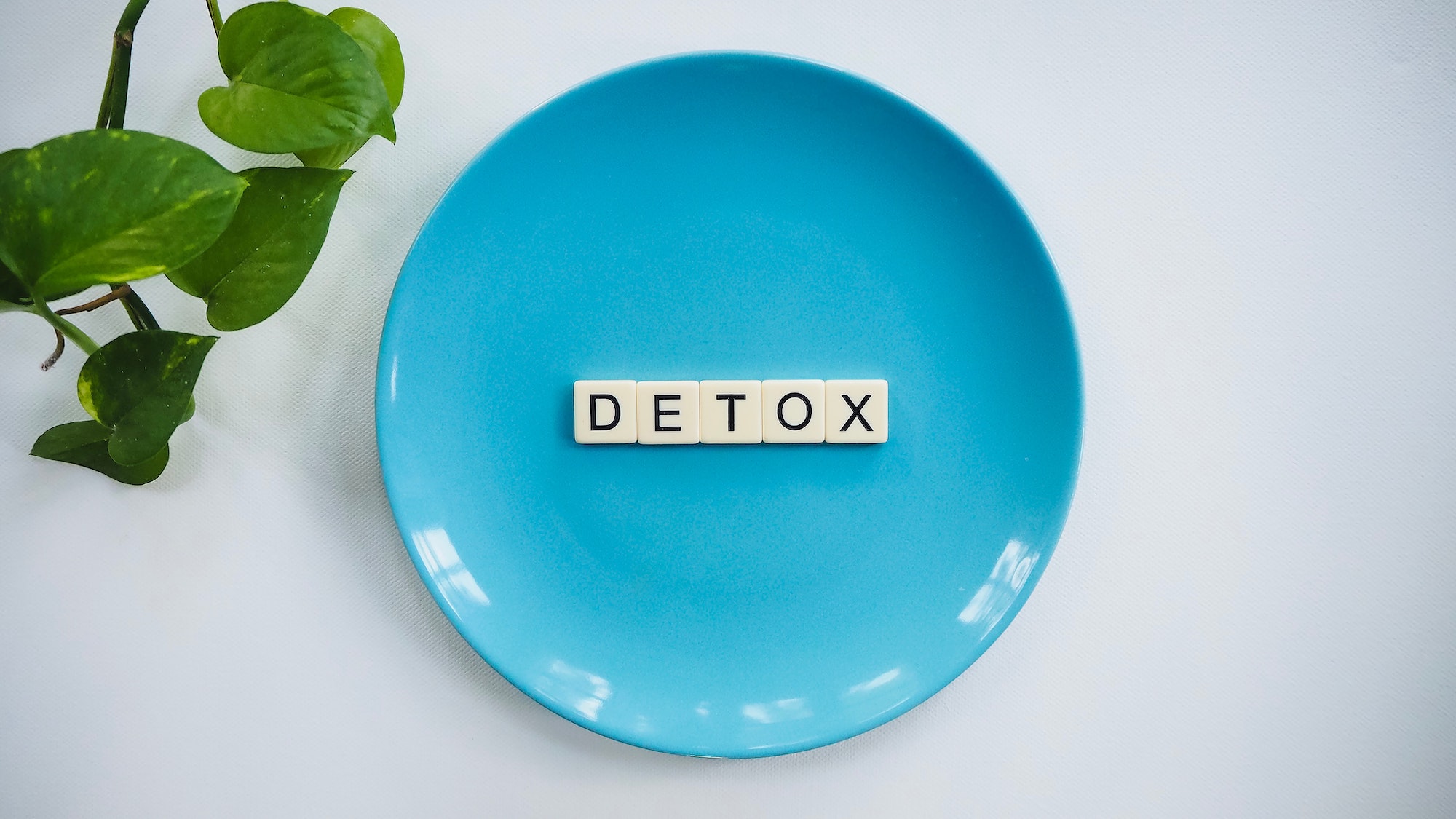 detox letters on a blue plate